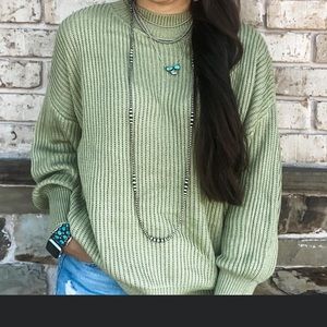 Miss green sweater
